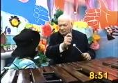 Popular hit: Moore gamely plays his instrument on Big Breakfast TV in early 1990s