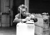 Pierre Matisse, Giacometti working on Four Figurines on a Stand at the Tate Gallery, 1965