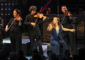Actor Rhiannon May with Aurora violinists including Alexandra Wood (left)