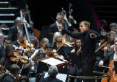 Vasily Petrenko and members of his Royal Philharmonic Orchestra