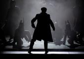 Impressive: Rambert dancers multitask as everything from strippers to police dogs