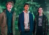 Jaden Michael as Mickey (centre), with Adrian Greensmith as Spoon and Abby Corrigan as Ema