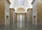 The grand space of the Duveen galleries, empty but for the melancholy sounds of 'War Damaged Musical Instruments'