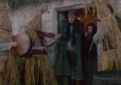 Hugh (Don Foley) and Maura O'Donnell (Mary Ryan) greet the straw men