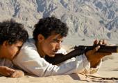 Shadow of a brother: Jacir Eid, left, as Theeb with brother Hussein (Salameh Hussein)