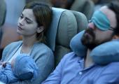 Unfriendly skies: Joanna (Jenna Coleman), Alistair (Ewen Leslie) and baby Noel en route to Melbourne