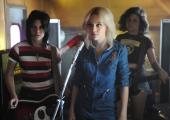 Bombs away: Joan Jett (Kristen Stewart, left) and Cherie Currie (Dakota Fanning) in The Runaways