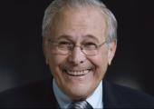 Smiling through: Donald Rumsfeld