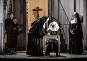 Natalya Romaniw's Suor Angelica forced to sign a document by her unforgiving aunt (Anne Mason, left)