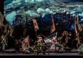 'So, it's begun': Simon Bailey's Kutuzov and the Welsh National Opera Chorus react to the first cannon-fire at Borodino