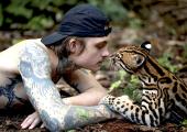 Harry Turner communes with Keanu the ocelot