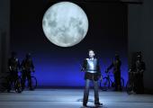 Rinaldo (Iestyn Davies) prepares to go into battle on his trusty bicycle