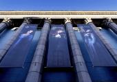Banners for the Birgit Nilsson prize on the blue exterior of Stockholm's Konserthuset