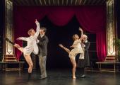 Buttoned-up Britishness: João Carolino and Mari Kamata in 'Town' by Matthew Bourne