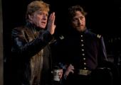 Director Robert Redford (left) with James McAvoy as Frederick Aiken