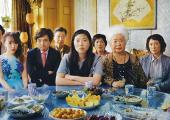 Meet the family: Billi (Awkwafina, centre) brings it all back home