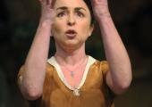 Samantha Spiro prays for a sign - or practises her best Eva Peron - in Eduardo De Filippo revival