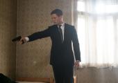 Shooter in a suit: Alex (James Norton)
