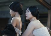 Role-play: Handmaid Sookee (Kim Tae-ri) and Lady Hideko (Kim Min-hee) swap jobs at bedtime