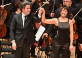 Gustavo Dudamel and Yuja Wang after the London premiere of John Adams's 'Must the Devil Have All the Good Tunes?'
