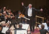 Valery Gergiev, running late but loving what he conducts