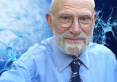 Oliver Sacks with a graphic image of the brain's synapses - a lifelong fascination