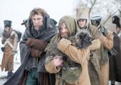 Pierre (Paul Dano) and Platon Karatayev (Adrian Rawlins) as prisoners on the retreat from Moscow