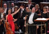 Cellist Sol Gabetta, players of the BBC Symphony Orchestra and their Chief Conductor Sakari Oramo at the First Night of the Proms in 2016