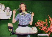 A snip in time: Joony Kim plays the hostess of a dog grooming show