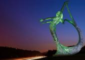 Andy Scott's Arria near Cumbernauld: 'A 33-foot busty silver mermaid that gestures at passers-by like a Vegas barmaid'