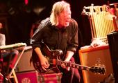 Michael Gira on stage with Swans