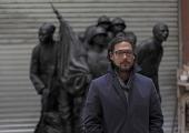 Presenter David Olusoga with sculpture commemorating 'the Black Heroes of Reims'