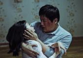Small-town policeman Jong-Gu (Kwak Do-Won) struggles with his possessed daughter in 'The Wailing'