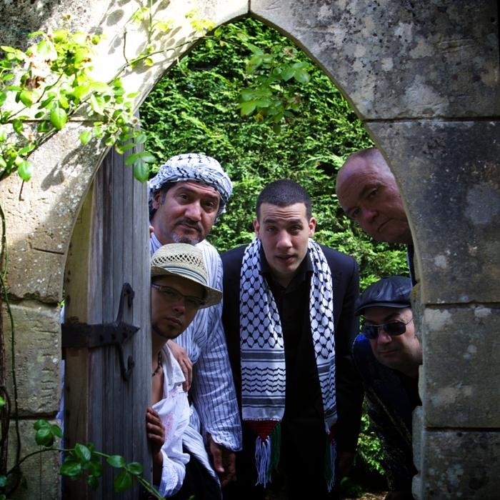 “Oh, there you are!” Some but not all of Syriana finally locate the photographer