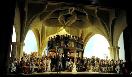 Nuremberg's beloved Hans Sachs (Gerald Finley) addresses the midsummer crowds