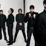 The full lineup of Pendulum, their facial hair as untrendy as their sound