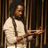 Abdou Ouloguem, one of the two actors out-charming the singers in a purgatorial dream world