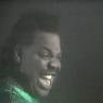 A still from the 'Love Can't Turn Around' video