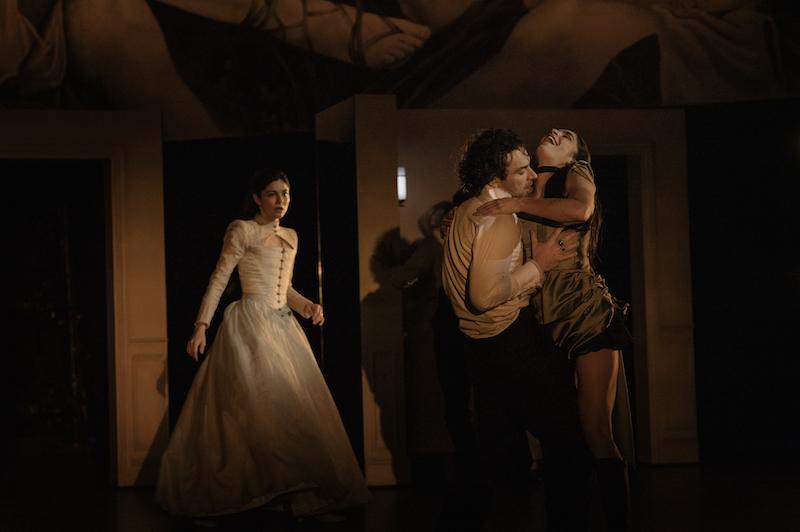 Madame de Tourvel watches as Valmont seduces a courtesan