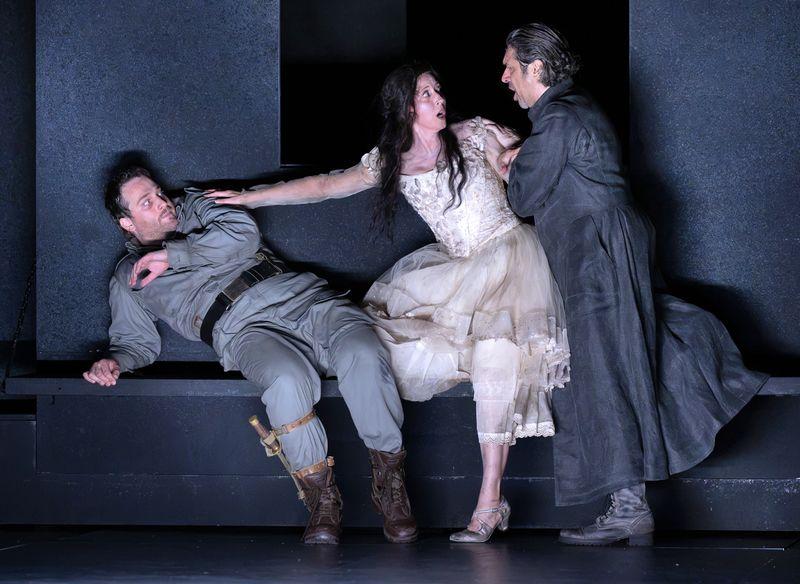 Elvira and the would-be restrainers in Act 2