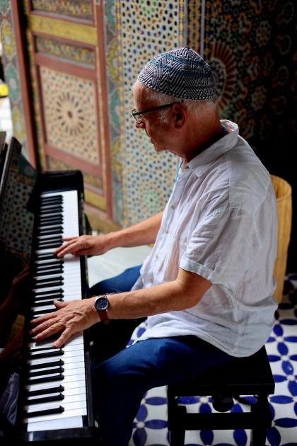 Peter Culshaw playing piano at Fes Gathering