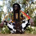 Cheikh Lo typically attired - Joseph, eat your heart out! 