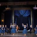 The ball scene designed by David Walker: 'the inky blue court theme allows Cinderella to arrive in her silvery tutu like the full moon in the night'